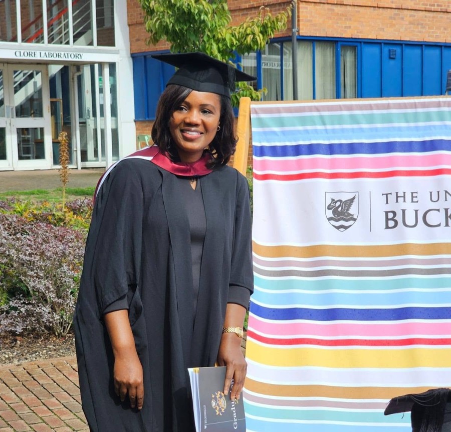 Kadine Reynolds graduating from the University of Buckingham