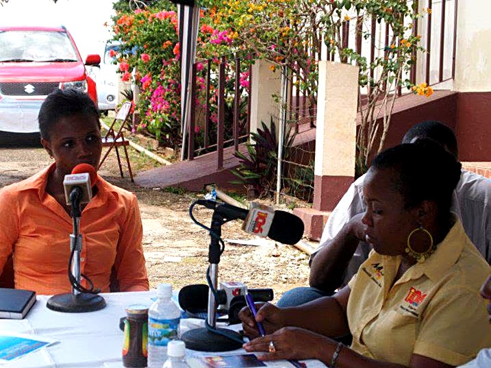 Kadine Reynolds being interviewed by radio media